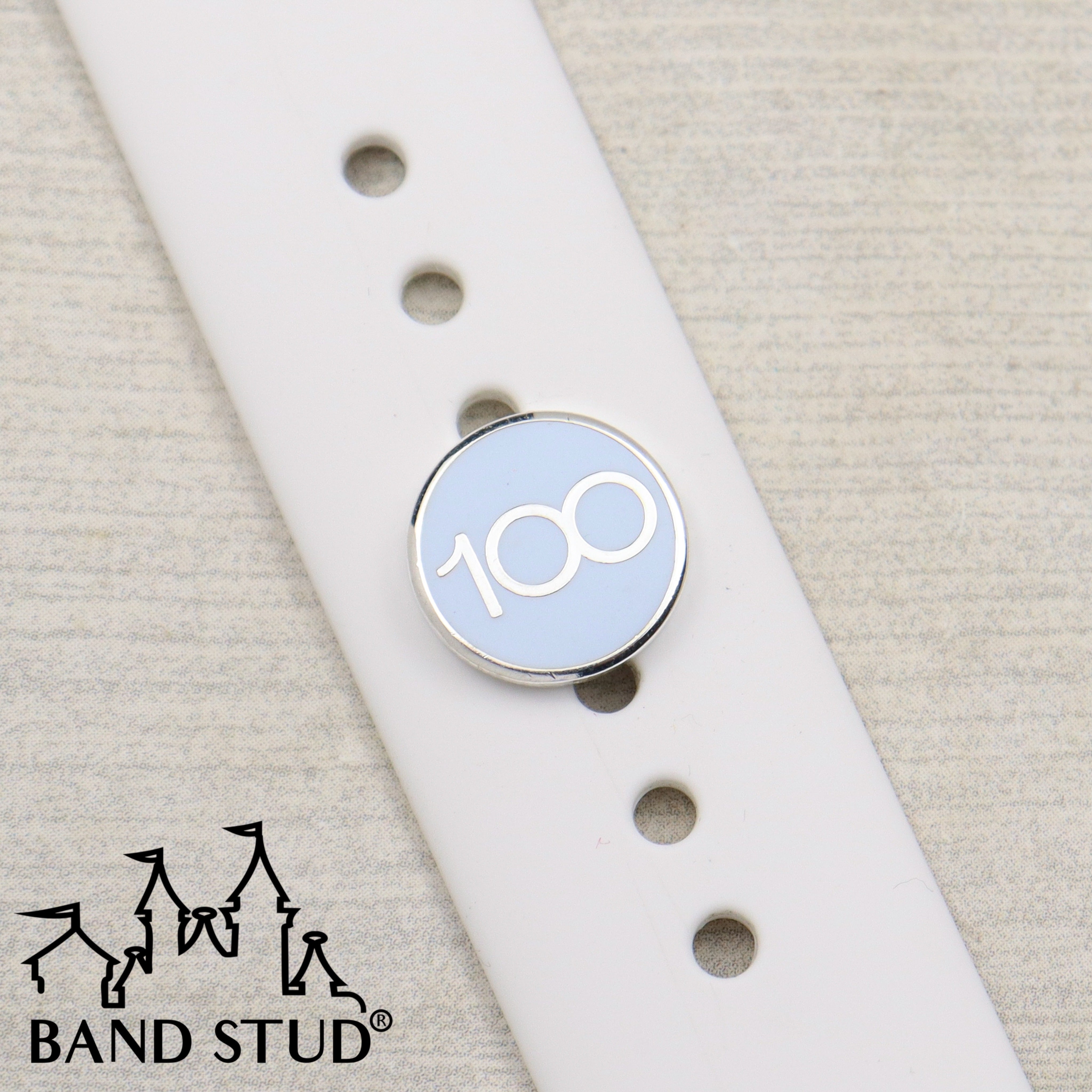 100th Celebration Band Stud® - Plaque MARKDOWN